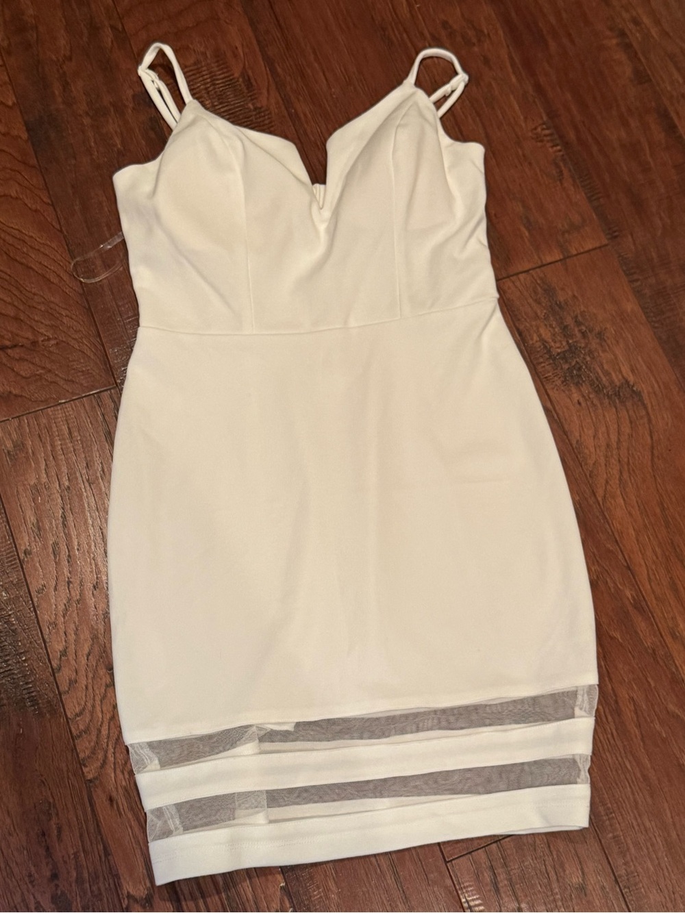 Speechless White V-Neck Bodycon Mini Dress with Sheer Hem